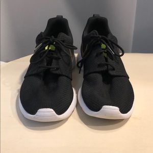 Nike Shoes - Black with gold Nike swoosh Nike Shoes - Black with gold Nike swoosh